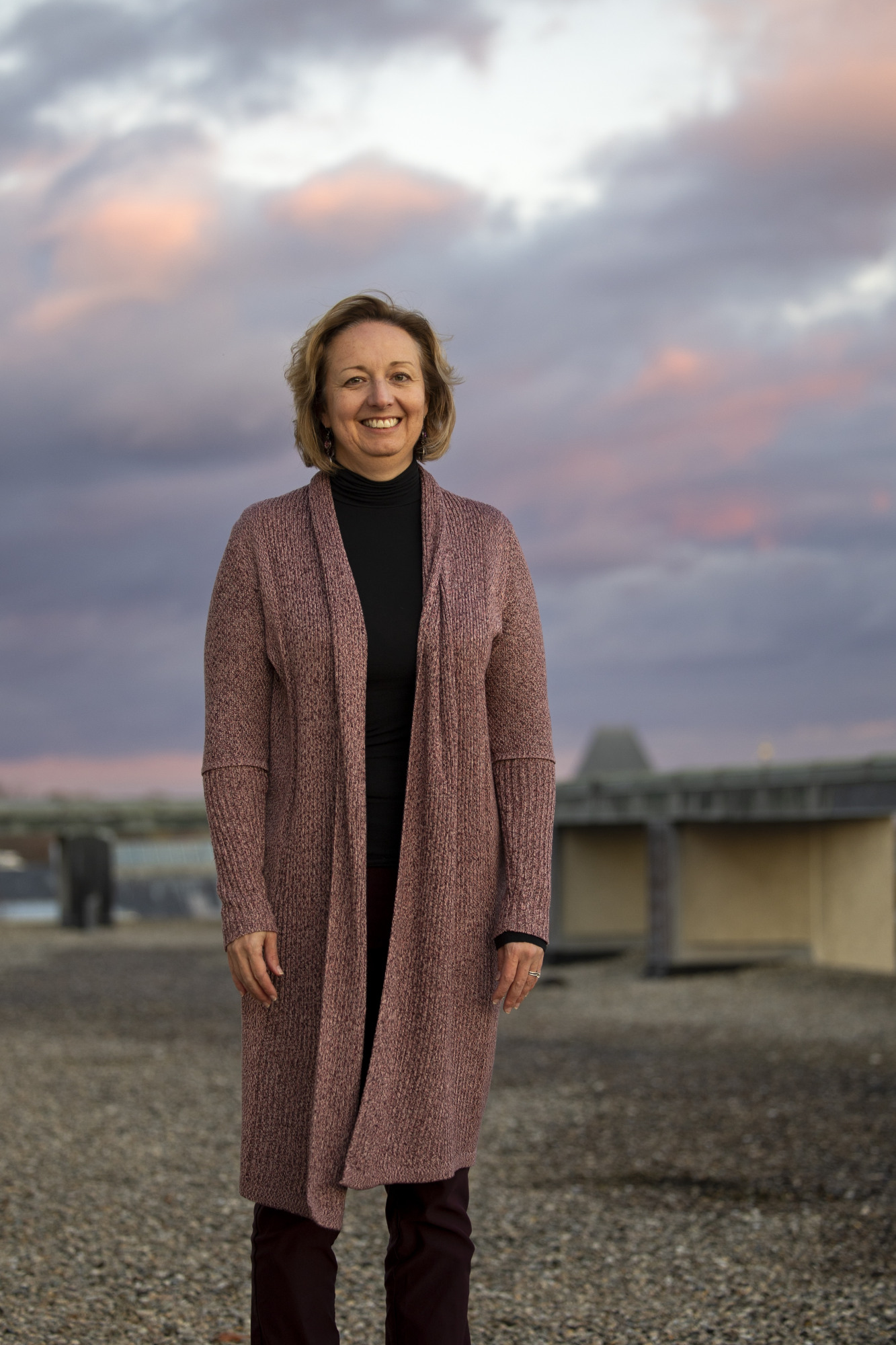 Meredith Hastings, oudoors with clouds in the background 