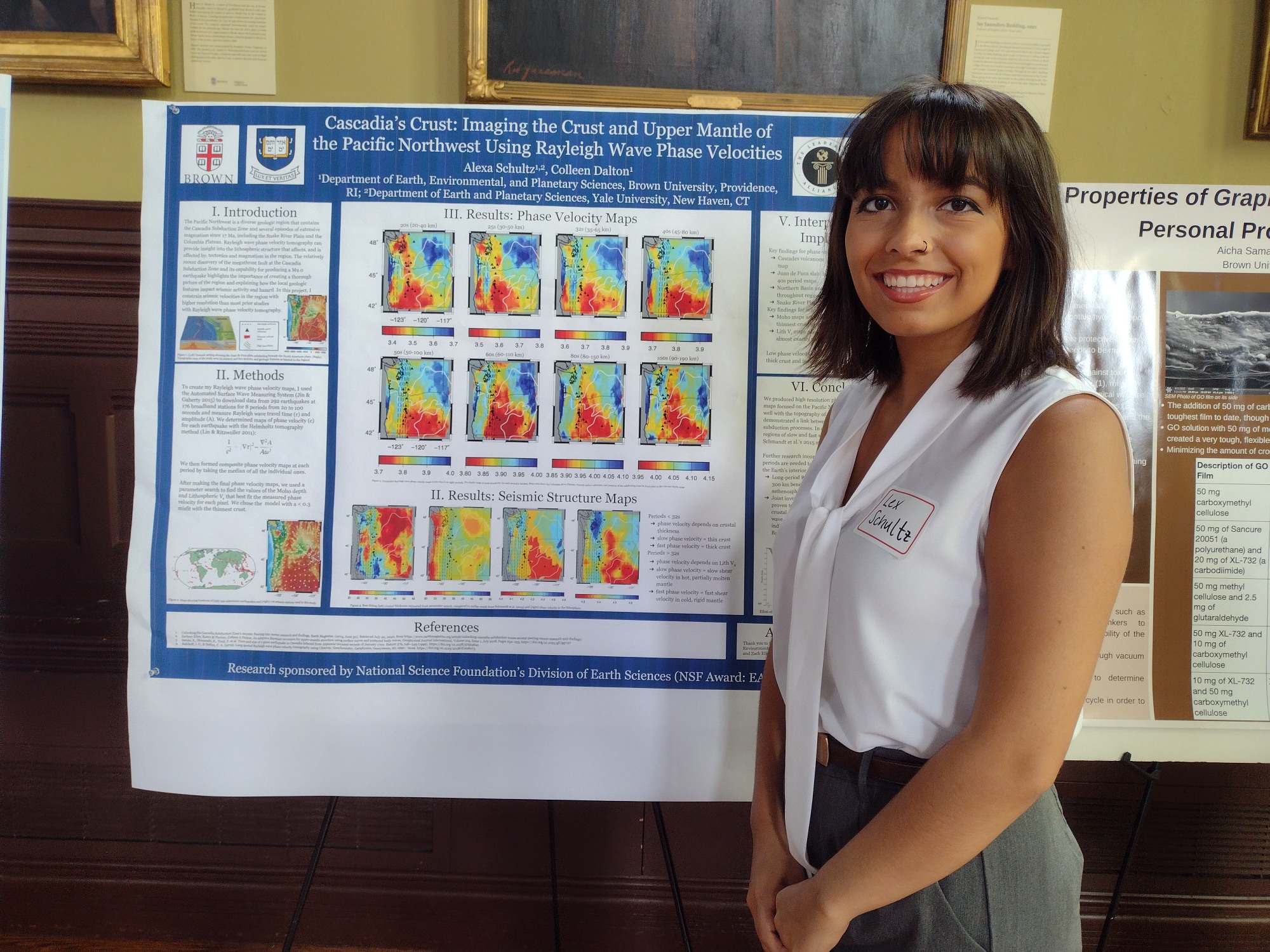 Alexa poses with her research poster. 