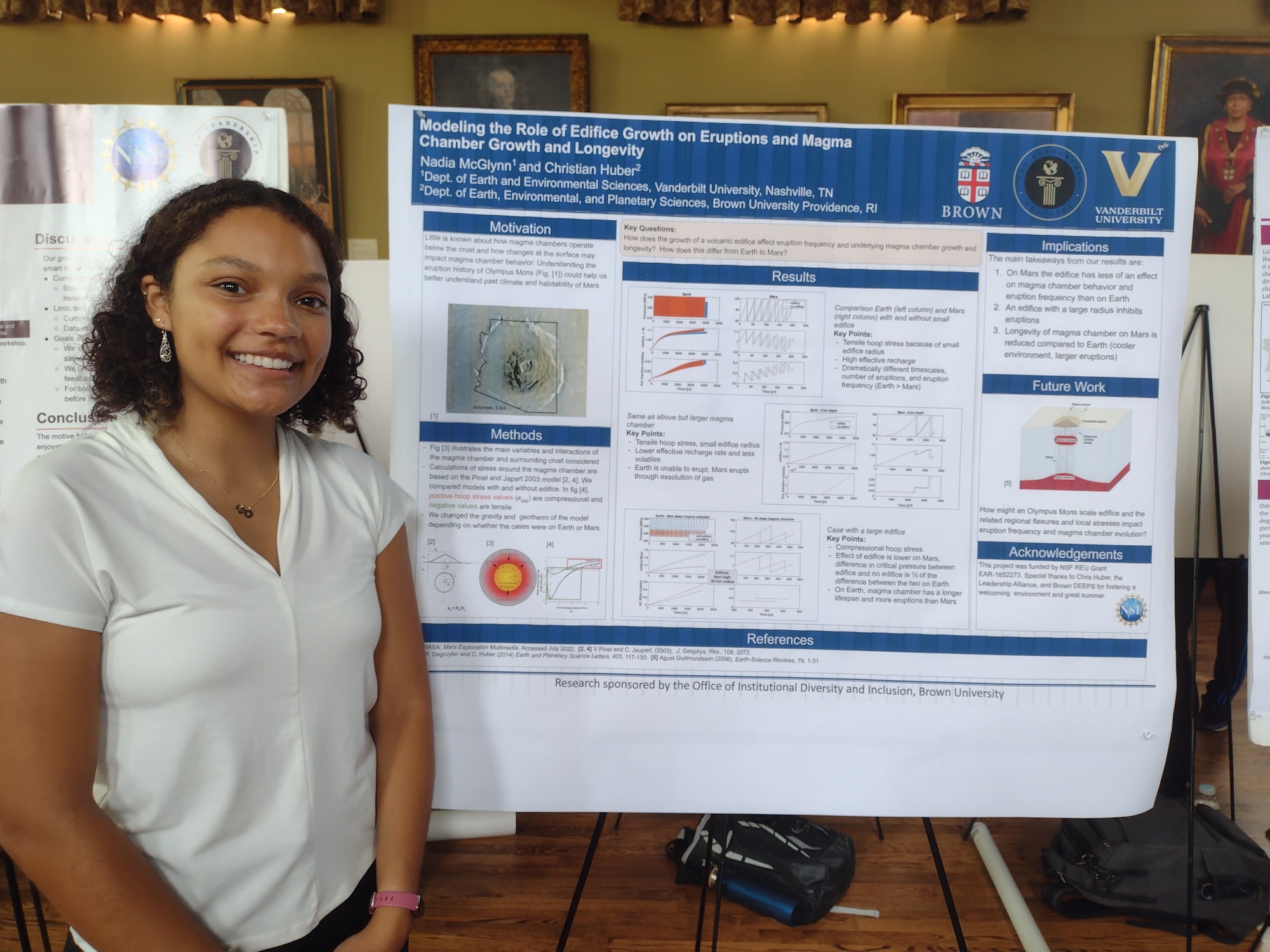 Nadia poses with her research poster. 