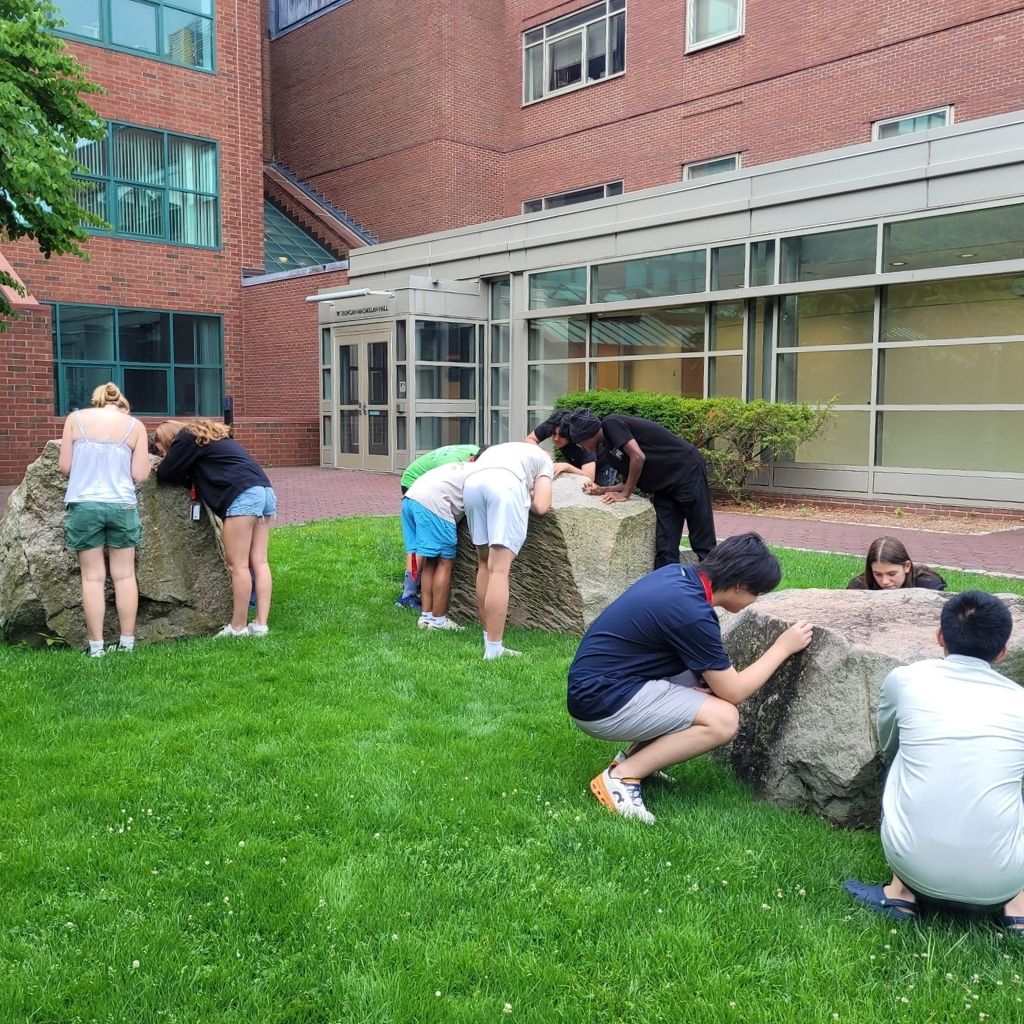 pre-college students investigating the Jan Tullis Memorial Stones