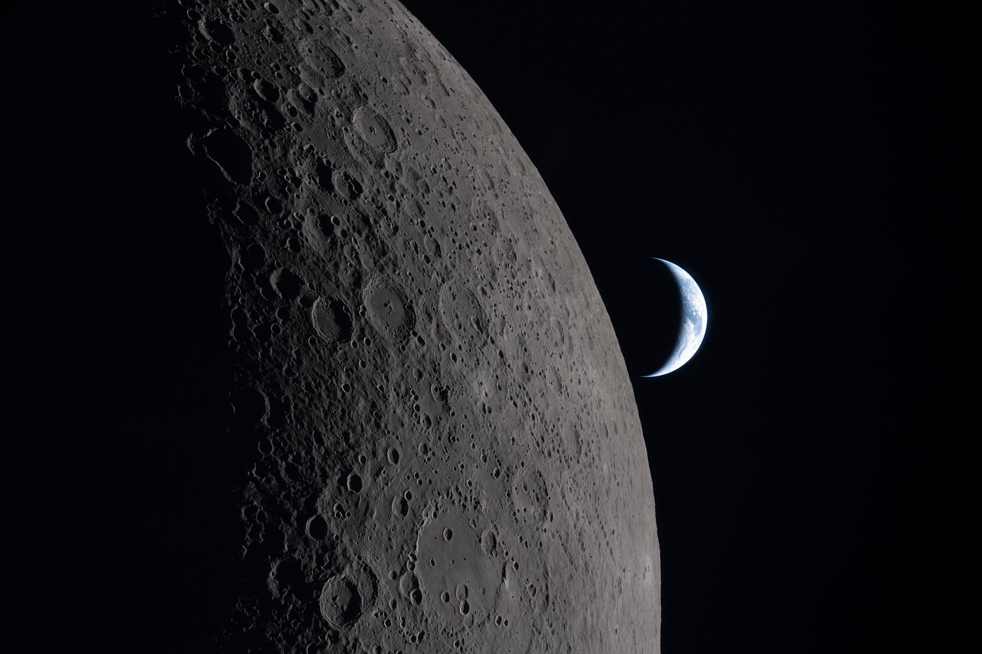 NASA photo from the Artemis II of the lunar surface overlooking the earth beyond