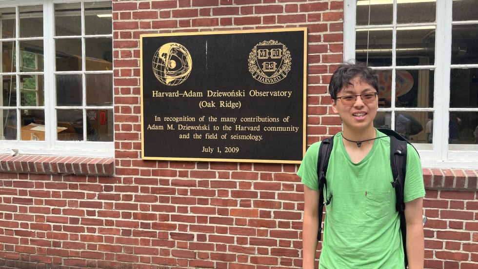 Daniel smiling outside the seismic station at Harvard, MA. 
