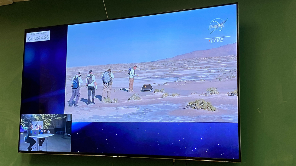 A photo of the NASA livestream video of scientists in UTAH. 
