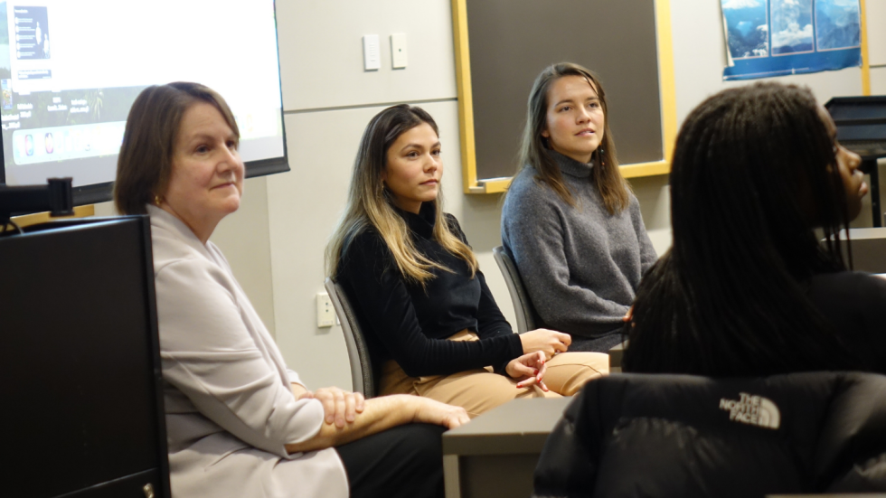 Isabella Gama Dantas, Mali'o Kodis, and Karen Fischer listening to a question from the crowd. 