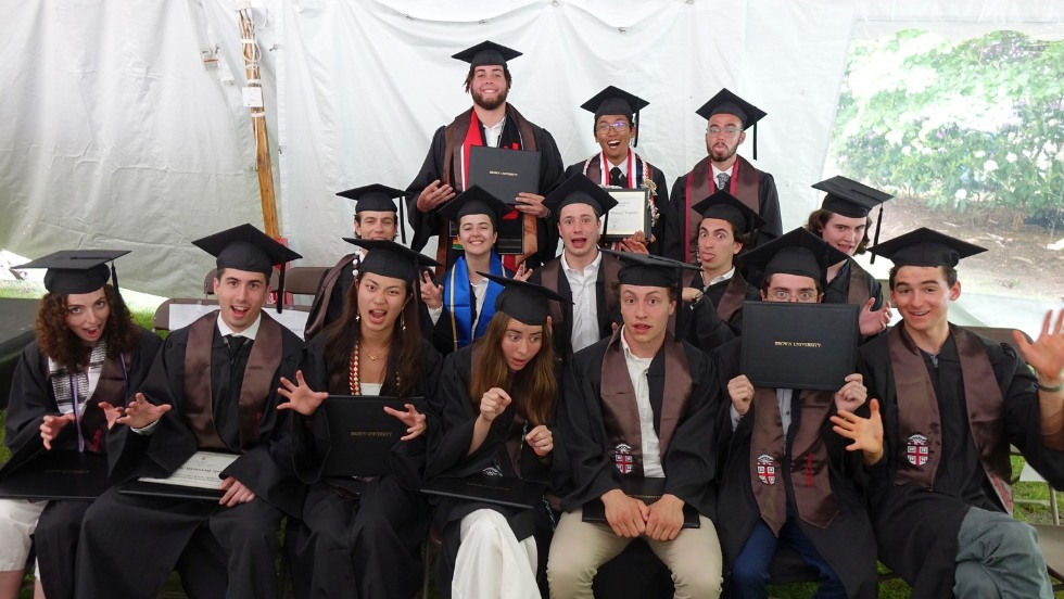 group photo of the graduating class of 2024, but with silly faces