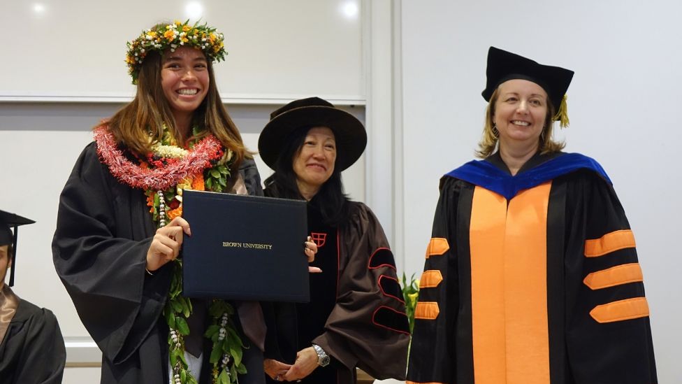 Celia Kong-Johnson receiving degree