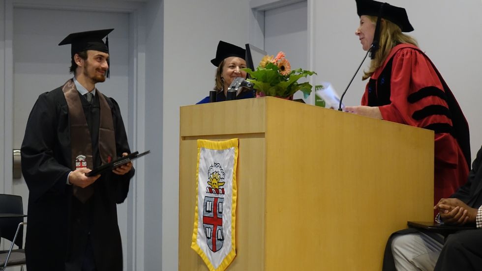 Gabriel Traietti receiving an award