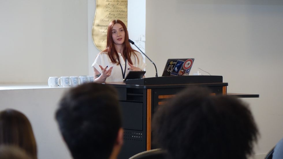 a graduate student presents her research 