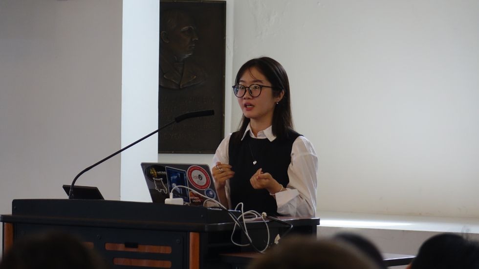 an undergraduate student presents her research 