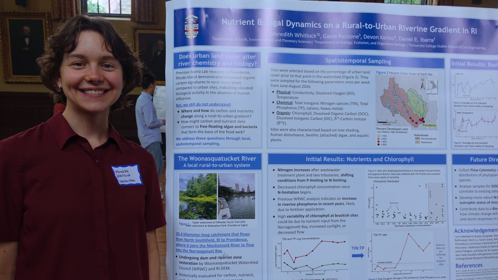 Meredith Whitlock beside her poster 