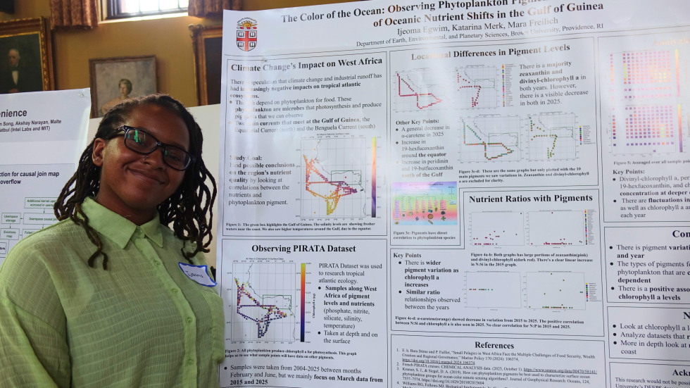 Ijeoma Egwim beside her poster 