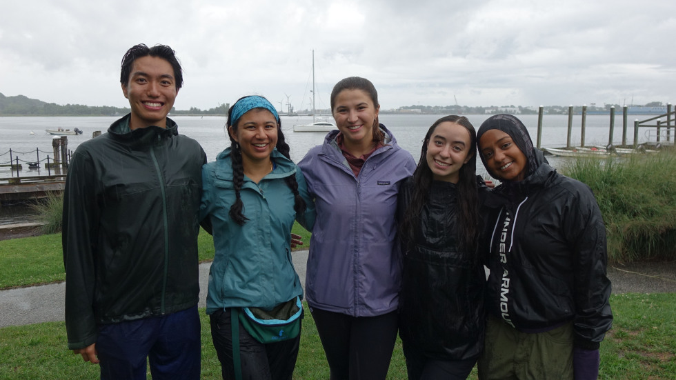 the sampling team poses for a group photo in the rain at India Point Park
