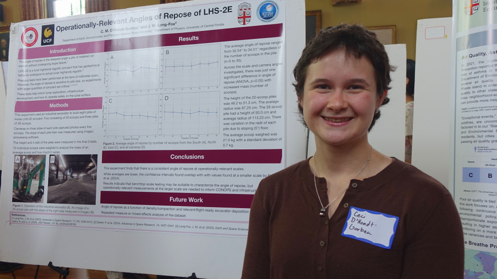 Cecilia D'Hondt-Gorbea beside her poster 