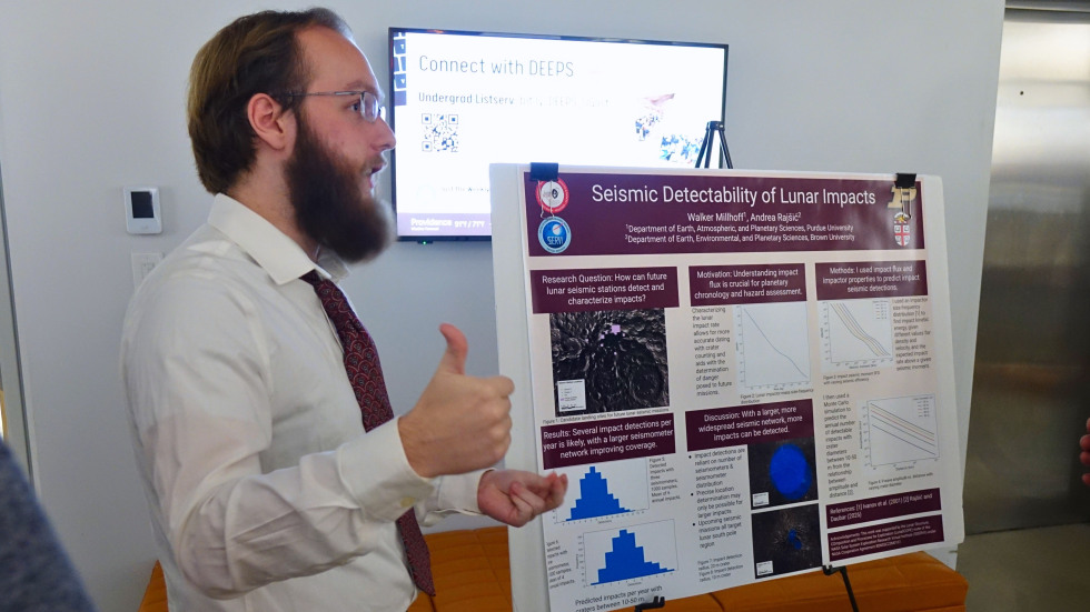 Walker Millhoff sharing his poster at the LunaSCOPE annual meeting